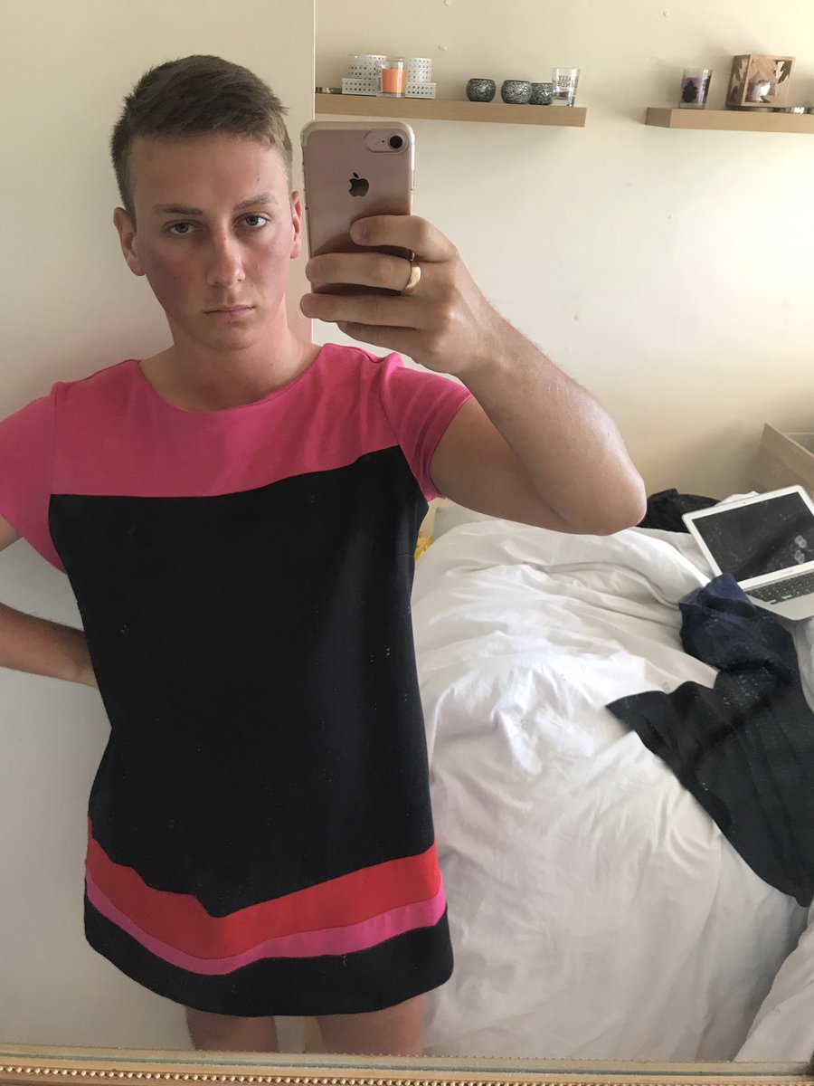 Bravo! This man wore a pink dress to work, after being sent home for wearing shorts