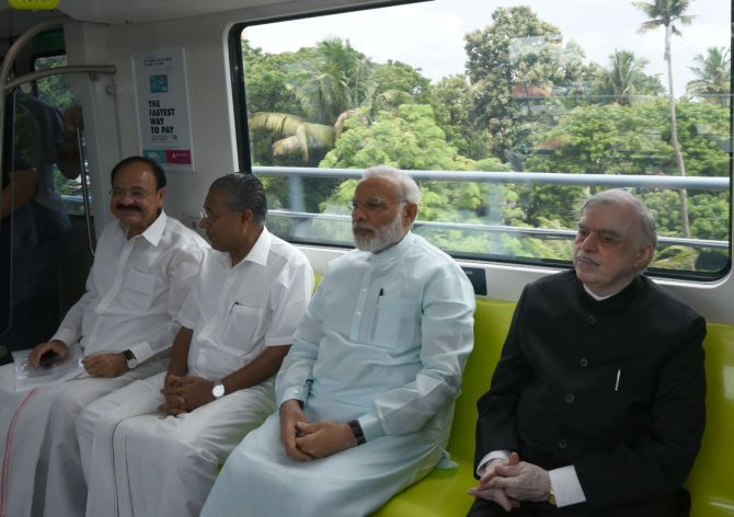 What is common between Kochi Metro and Dhola Sadiya Bridge?