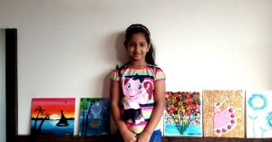 This 7-year-old sells her art to raise funds for the underprivileged kids