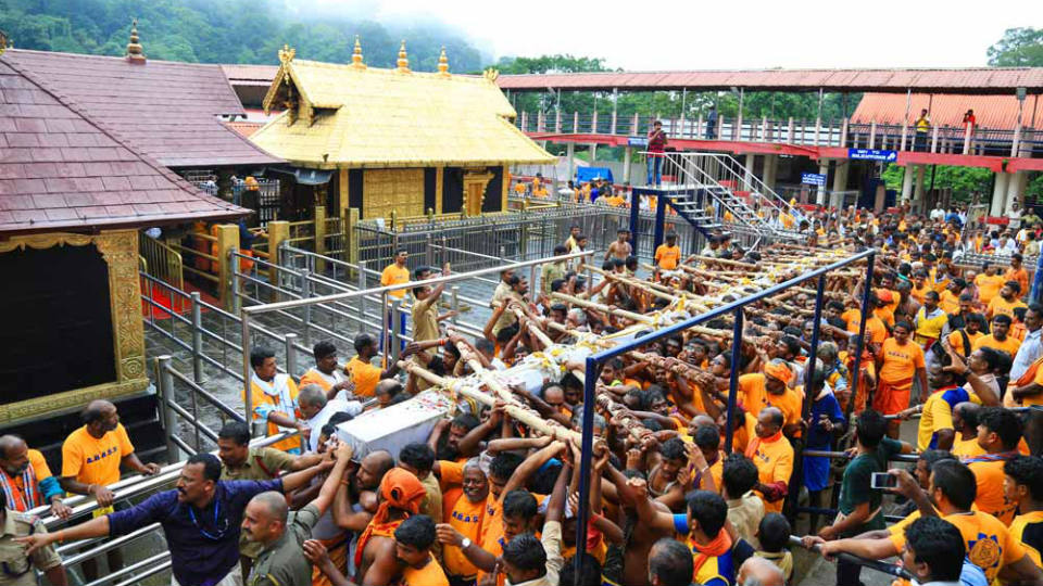 Woman, 52, allowed inside Sabarimala temple after initial protests