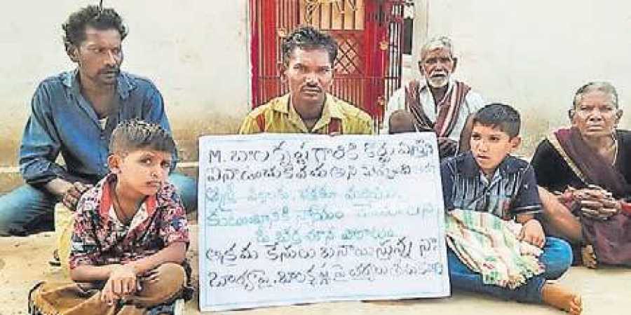 Man along with 3 children protests outside wife’s lover’s house, begs her to return
