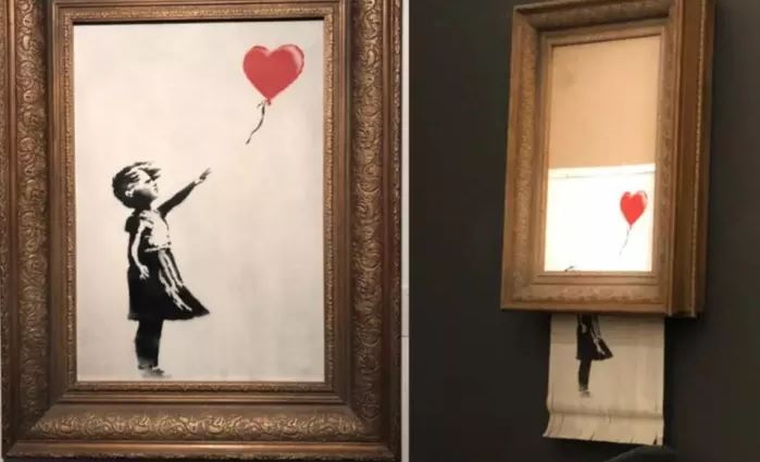 Art Prank: Banksy’s ‘Girl with Red Balloon’ painting self-destructs after $1m sale at auction