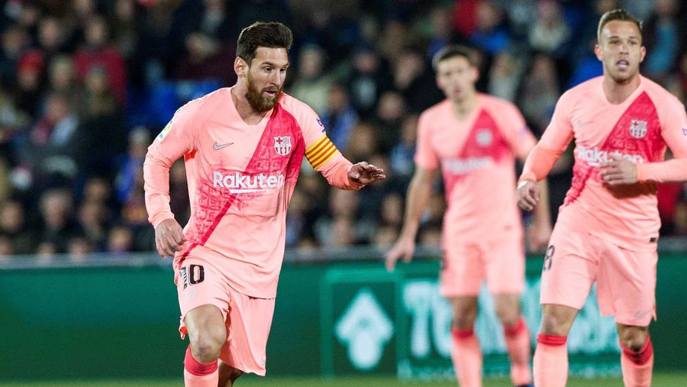 Messi, Luis Suarez lead Barcelona to 2-1 win over Getafe