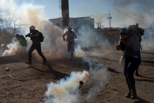 US fires tear gas at Mexico border to deter migrants