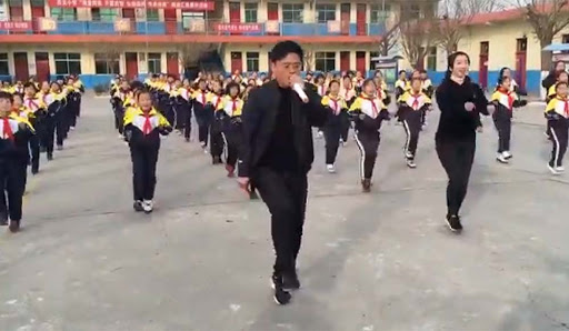 Students follow this Chinese principal’s dance moves to stay fit, away from computers