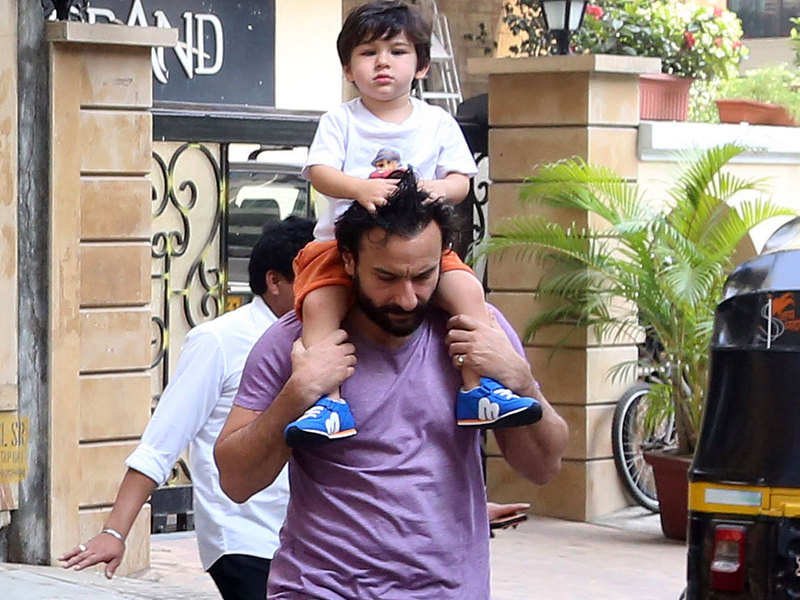 Taimur piggyback riding on Saif Ali Khan's shoulders is the cutest thing today!