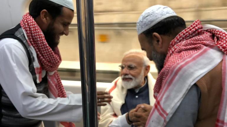 PM Modi takes metro ride on way to ISKON temple, interacts with passengers