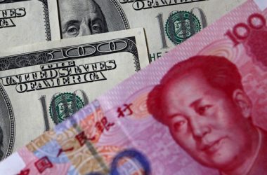 China's yuan edges lower against US dollar