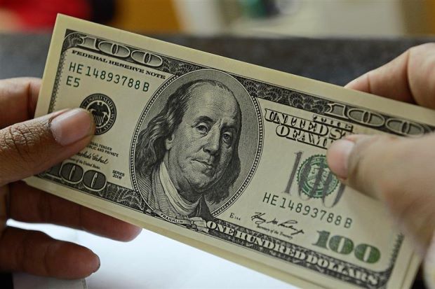 US dollar falls ahead of Federal Reserve's meeting