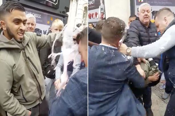 Watch: Man throws milkshake at EU election candidate Tommy Robinson