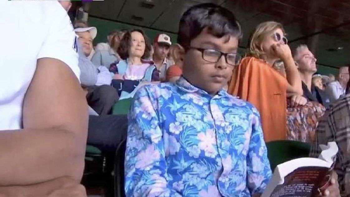 Boy engrossed in book during Federer-Nadal Wimbledon clash goes viral
