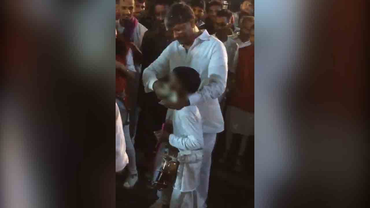 Watch: Telangana Deputy Speaker Padma Rao stuffs money into child's mouth during Bonalu festival