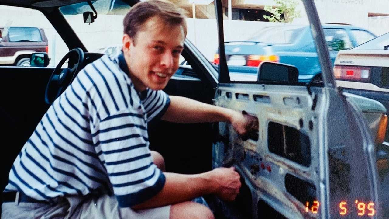 Elon Musk's mother shares a 1995 photo of him fixing car window