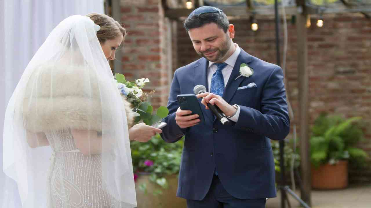 Couple exchanges digital 'NFT' rings with wedding vows