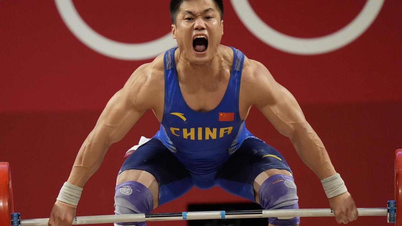 Chinese Lyu Xiaojun becomes oldest weightlifter at 37 to win Olympic gold