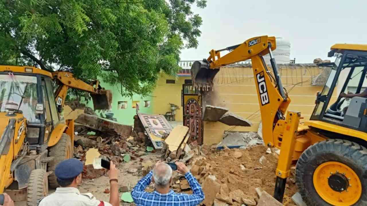 MP administration demolishes houses of accused who tied up, dragged tribal man to death