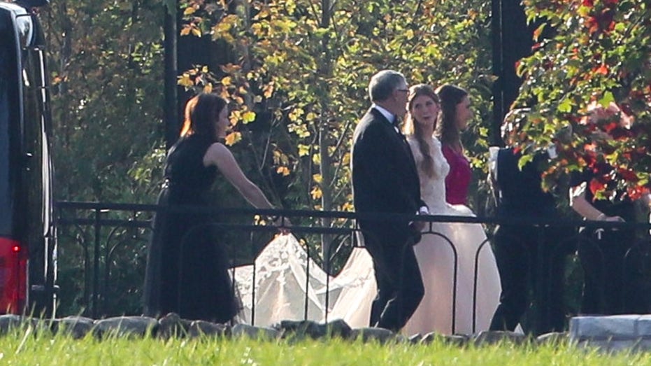 Bill, Melinda Gates walk daughter down the aisle
