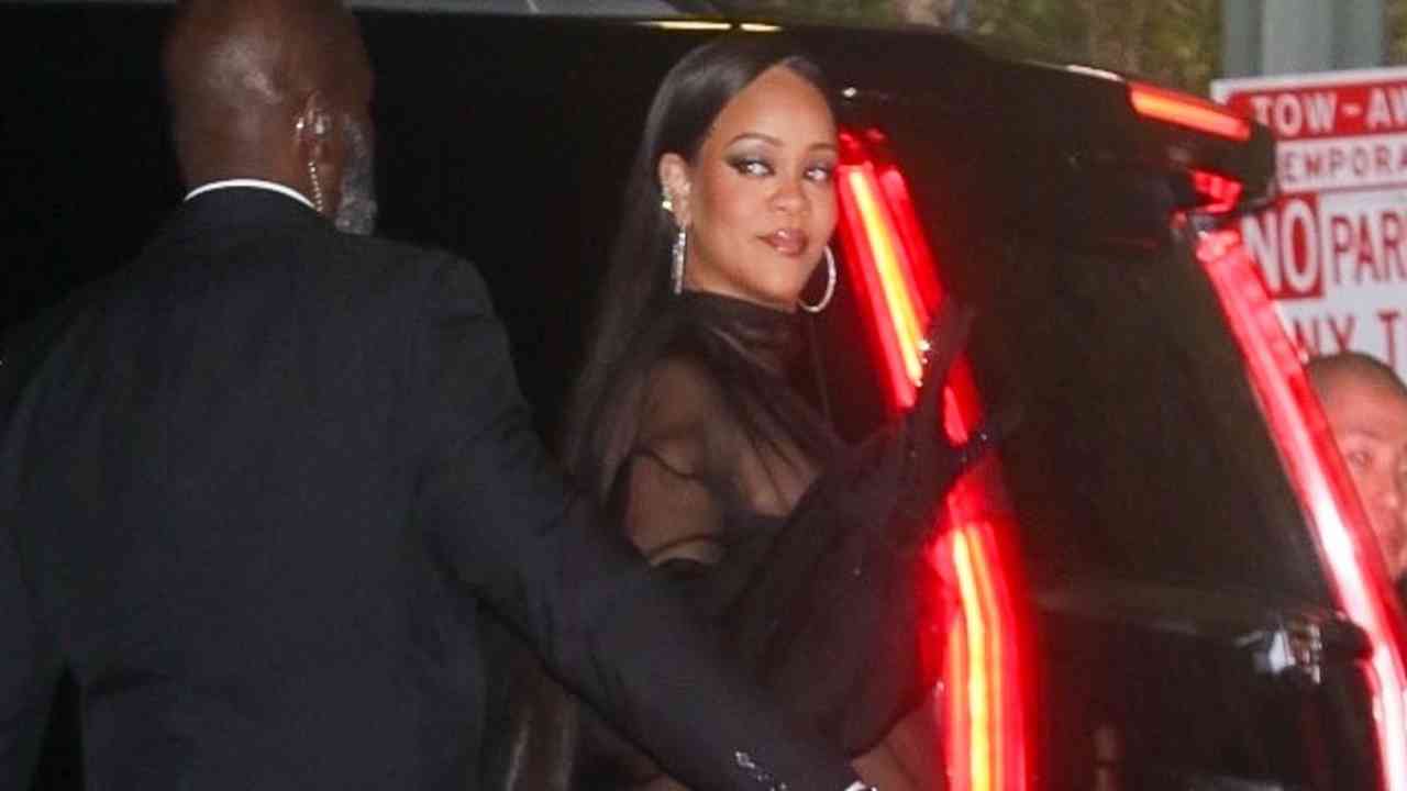 Rihanna flaunts growing baby bump in belly baring sheer dress at 2022 Oscars After Party