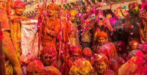 People throng at Vrindavan's Banke Bihari temple to celebrate Holi