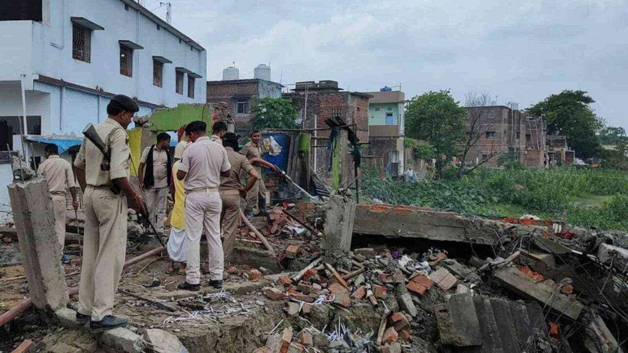 At least five people, including two children and a woman, have been killed and four others injured in a massive explosion in an illegal firecracker unit in Bihar's Saran district on Sunday, police said. Saran Superintendent of Police Santosh Kumar told reporters that the blast was so powerful that the three-storey building in Khodaibag Bazar from which the illegal firecracker factory was operating, collapsed. The exact cause of the blast is yet to be ascertained but it is suspected that LPG cylinders kept inside the house also exploded, he said. The owner of the illegal factory, identified as 22-year-old Shabir Hussain, was among those who died on the spot. Other deceased include 35-year-old Mulazim, 32-year-old Shabana Khatoon and five-year-old Shazad. Another four-year-old child, who also died in the incident, is yet to be identified, he said. Of the four others injured in the incident, the condition of a woman is critical and she has been shifted to Patna for better treatment, the officer said. ''Operations are underway to rescue trapped persons, if any, from under the debris. Forensic experts from Patna are assisting local police in the investigation,'' he added.